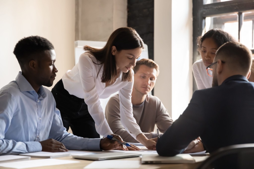 a group of credit managers discussing techniques for sound credit management